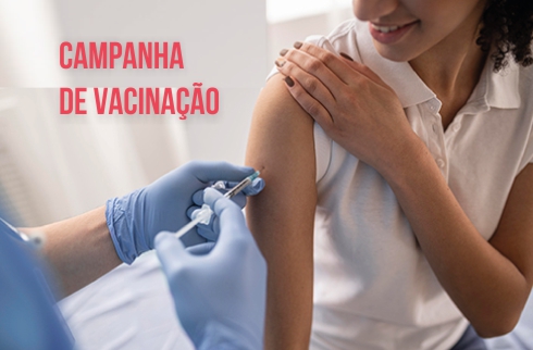 Imagem onde aparece uma mulher sendo vacinada e o texto 'Campanha de vacinação' 
