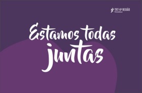 Imagem de fundo lilás e letras brancas escrito: "Estamos todas juntas"