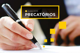 Imagem em super close mulher segurando uma caneta e o texto 'guia prático dos precatórios'